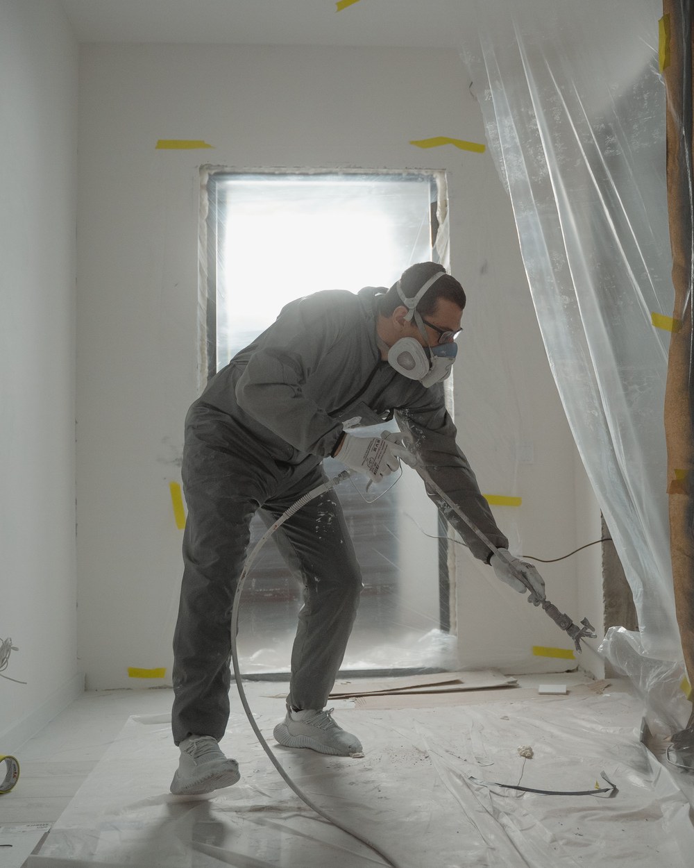 Fresh paint being applied ahead of a listing, illustrative stock photo